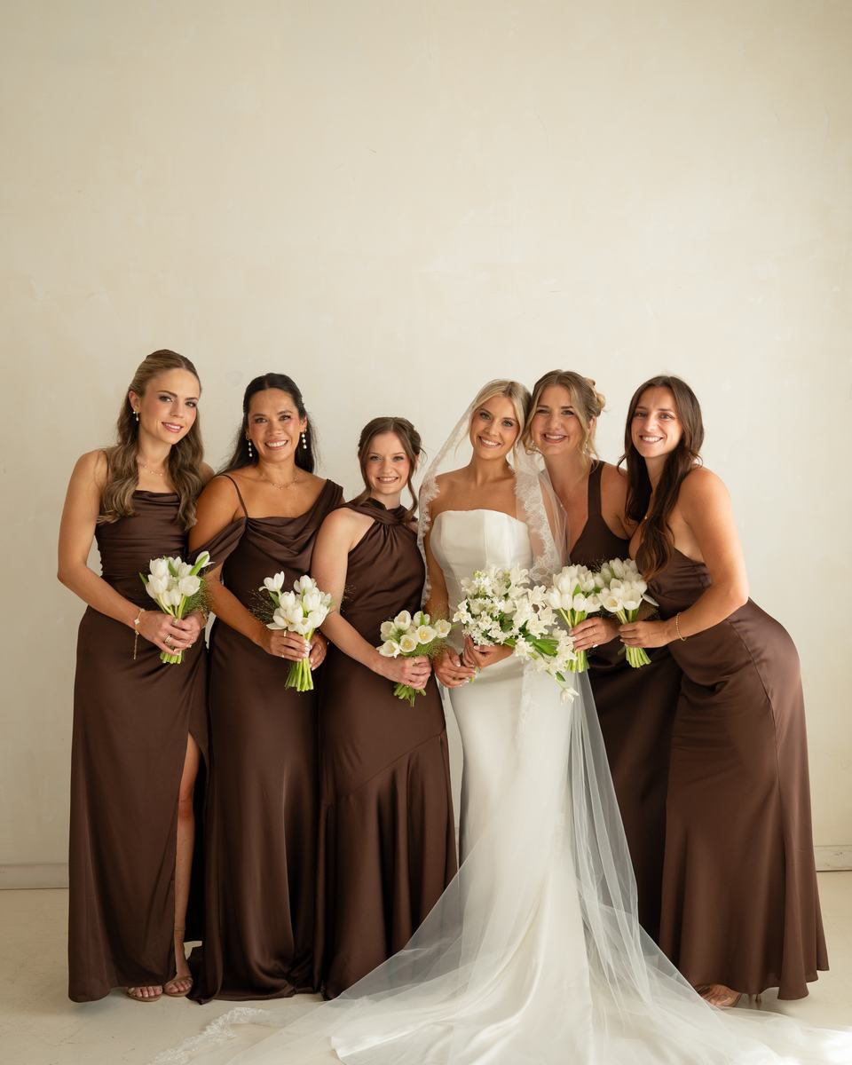 A bride and her bridal party, hair and makeup by Blossom Beauty Team